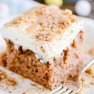 Carrot cake soaked in a homemade caramel sauce topped with a cream cheese whipped topping. This is an Easter show stopper!