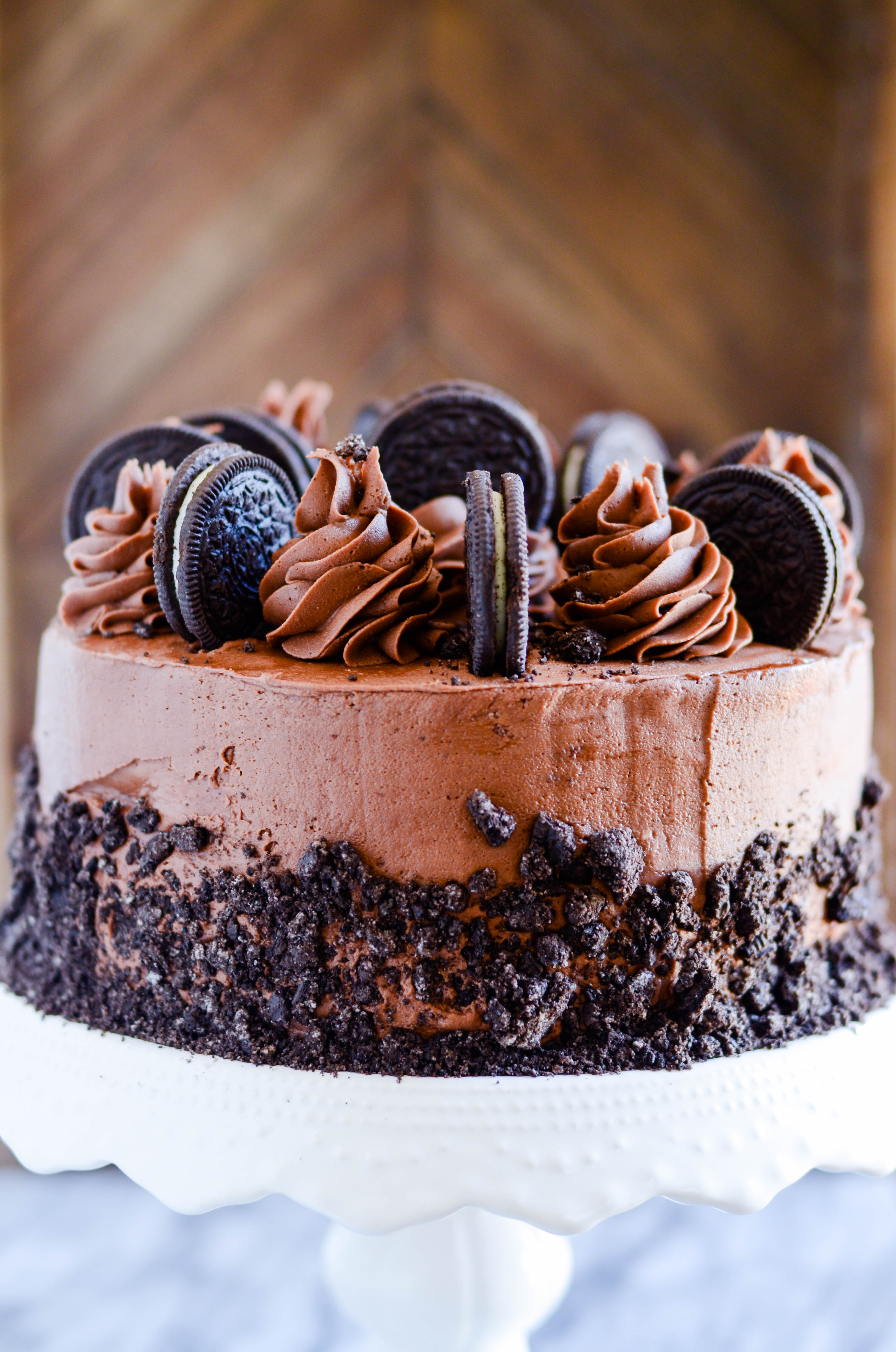 Two layers of rich, chocolate Oreo cake with a fudgy chocolate buttercream and Oreo crumbles on top.