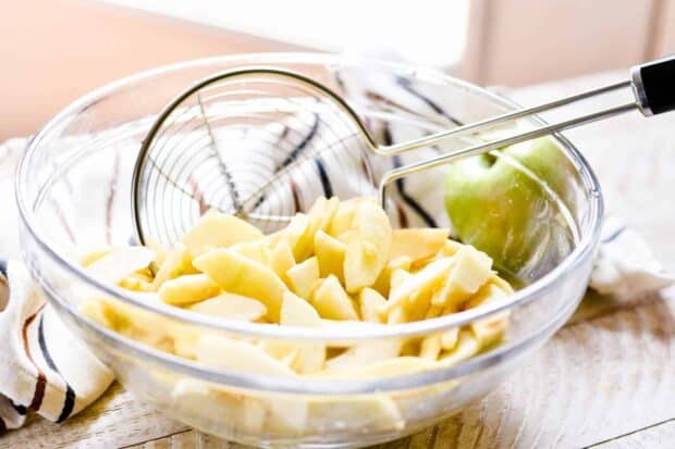 Cut apples in a bowl for apple pie
