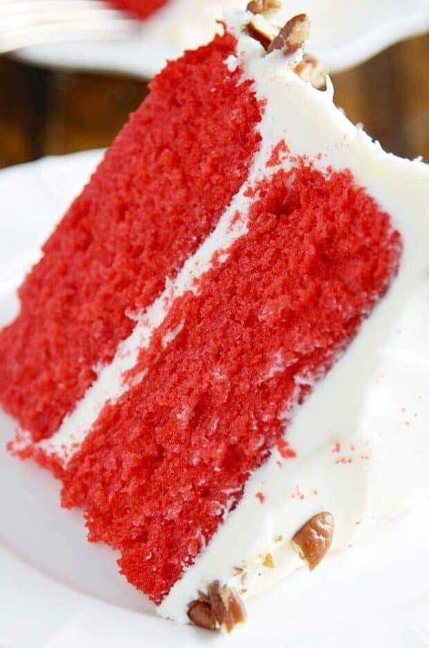 Supremely moist and delicious Red Velvet Cake with cream cheese frosting. Perfect Cake Man Raven's Red Velvet cake for Valentine's Day. 